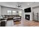 Inviting living room boasts hardwood floors, a cozy fireplace, and ample natural light at 1823 Lynwood Ln, Atlanta, GA 30329
