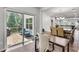 Bright home office with sliding glass doors to a deck, offering a tranquil workspace with natural light at 1823 Lynwood Ln, Atlanta, GA 30329