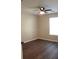 Bedroom featuring a ceiling fan, window with blinds, and hardwood floor at 3501 Shepherds Path, Decatur, GA 30034