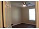 Bright bedroom with a ceiling fan, closet, and a window at 3501 Shepherds Path, Decatur, GA 30034