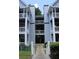 Condo building with pedestrian entrance offers multi-level living with exterior balconies at 3501 Shepherds Path, Decatur, GA 30034