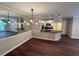 Modern kitchen features stainless steel appliances, black countertops, and updated lighting at 3501 Shepherds Path, Decatur, GA 30034