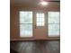 The living area offers lots of sunlight and access to an outside area at 3501 Shepherds Path, Decatur, GA 30034