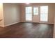 Bright living room has new flooring and sliding door access to the exterior at 3501 Shepherds Path, Decatur, GA 30034