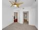 Clean bedroom with neutral carpet and doorway to other rooms at 230 E Ponce De Leon Ave # 116, Decatur, GA 30030