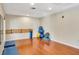 The light filled yoga studio has wood floors, a barre, and mats for exercise at 230 E Ponce De Leon Ave # 116, Decatur, GA 30030