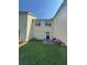 Lush backyard with a petite patio and well-maintained lawn; a perfect Gathering spot at 2390 Coach Way, Jonesboro, GA 30236