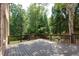 Spacious wooden back deck overlooking trees and backyard at 360 Hannaford Dr, Roswell, GA 30075