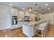 Bright, spacious kitchen with granite countertops and stainless steel appliances at 360 Hannaford Dr, Roswell, GA 30075