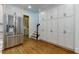 Stainless steel fridge next to a wall of cabinets with storage space at 360 Hannaford Dr, Roswell, GA 30075