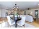 Open living space with dining area and modern lighting at 360 Hannaford Dr, Roswell, GA 30075