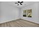 Cozy bedroom with natural light from window and ceiling fan for added comfort at 1249 Creek Forest Ln # Bldg 8, Austell, GA 30106