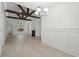 Bright dining area with modern chandelier, wood floors, and decorative wall trim at 1249 Creek Forest Ln # Bldg 8, Austell, GA 30106