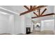 Spacious living area showcasing a fireplace and kitchen counter with pendant lights at 1249 Creek Forest Ln # Bldg 8, Austell, GA 30106
