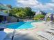 Sparkling community pool with waterfall feature and plenty of seating for residents to enjoy the outdoors at 173 Northshore Xing, Dallas, GA 30157