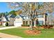 Charming two-story home with a well-manicured lawn, attached garage, and a welcoming entrance at 173 Northshore Xing, Dallas, GA 30157