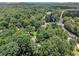 A home surrounded by lush, mature trees at 186 Fernleaf Lane Ln, Marietta, GA 30068