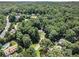A home surrounded by lush, mature trees at 186 Fernleaf Lane Ln, Marietta, GA 30068