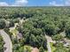 View of neighborhood with lush trees and sprawling residences at 186 Fernleaf Lane Ln, Marietta, GA 30068