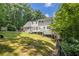 Expansive backyard featuring a spacious deck, perfect for outdoor entertaining and relaxation at 186 Fernleaf Lane Ln, Marietta, GA 30068