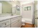 Bright bathroom features granite countertops, modern vanity, and shower-tub combination at 186 Fernleaf Lane Ln, Marietta, GA 30068