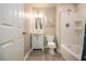 Well-maintained bathroom featuring a shower-tub combination and a white vanity at 186 Fernleaf Lane Ln, Marietta, GA 30068