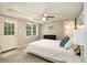 Comfortable bedroom with ceiling fan, natural light, and closet for ample storage at 186 Fernleaf Lane Ln, Marietta, GA 30068