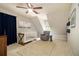Bedroom features neutral walls, stylish decor, ceiling fan, crib and blue curtains at 186 Fernleaf Lane Ln, Marietta, GA 30068