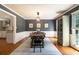Stylish dining room with modern light fixture, hardwood floors, and elegant decor at 186 Fernleaf Lane Ln, Marietta, GA 30068