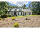 Classic two-story home with well-kept landscaping and beautiful curb appeal at 186 Fernleaf Lane Ln, Marietta, GA 30068