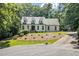 Beautiful two-story home with a well-maintained lawn and lovely landscaping at 186 Fernleaf Lane Ln, Marietta, GA 30068