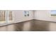 Open living space featuring access to a backyard and hardwood flooring at 1900 Van Allen Ct, Dacula, GA 30019