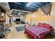 Finished basement area with bedroom, carpeted floor and exposed duct work at 2247 Cypress Ave, Morrow, GA 30260