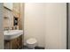 A very outdated bathroom featuring a vintage sink and toilet in need of renovation at 2247 Cypress Ave, Morrow, GA 30260
