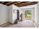 Bedroom featuring white walls, neutral carpet and sliding door to outside at 2247 Cypress Ave, Morrow, GA 30260