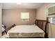 Bedroom with a double bed and window providing natural light at 2247 Cypress Ave, Morrow, GA 30260