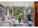 Cozy sunroom with comfortable seating and view of the backyard at 2247 Cypress Ave, Morrow, GA 30260