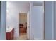 Bright bathroom with modern vanity and access to a walk-in closet for convenient storage solutions at 2423 Walnut Tree Ln, Buford, GA 30519