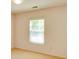 Bedroom featuring carpet flooring and a window with blinds at 2423 Walnut Tree Ln, Buford, GA 30519