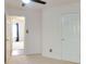 Bedroom featuring carpet flooring, a ceiling fan, and two doors at 2423 Walnut Tree Ln, Buford, GA 30519