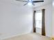 Bedroom with carpet flooring, a ceiling fan and natural light from a window with blinds at 2423 Walnut Tree Ln, Buford, GA 30519