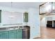 Stylish kitchen with stainless steel appliances, undermount sink, and eat in breakfast bar at 2423 Walnut Tree Ln, Buford, GA 30519