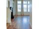 Open living room with new hardwood floors and a fireplace at 2423 Walnut Tree Ln, Buford, GA 30519