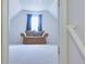 Spacious loft bathed in natural light with cozy seating, perfect for relaxing and unwinding at 2423 Walnut Tree Ln, Buford, GA 30519
