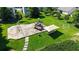 Well-maintained community playground with swings and climbing structures and soccer goals at 2423 Walnut Tree Ln, Buford, GA 30519