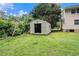 Backyard shed for extra storage and lawn maintenance at 60 Newton Ridge Dr, Covington, GA 30014