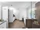 Luxurious primary bathroom featuring a soaking tub, walk-in shower, and elegant finishes at 10560 Haynes Bridge Rd, Alpharetta, GA 30022