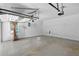 Spacious two car garage with high ceilings and window for natural light at 10560 Haynes Bridge Rd, Alpharetta, GA 30022