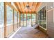 Spacious screened porch, perfect for enjoying the outdoors while staying protected from the elements at 10560 Haynes Bridge Rd, Alpharetta, GA 30022