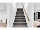 Stairway leading up to a great kitchen and living space at 10560 Haynes Bridge Rd, Alpharetta, GA 30022